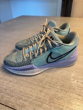Nike Women’s Sabrina Teal & Purple Basketball Shoes
